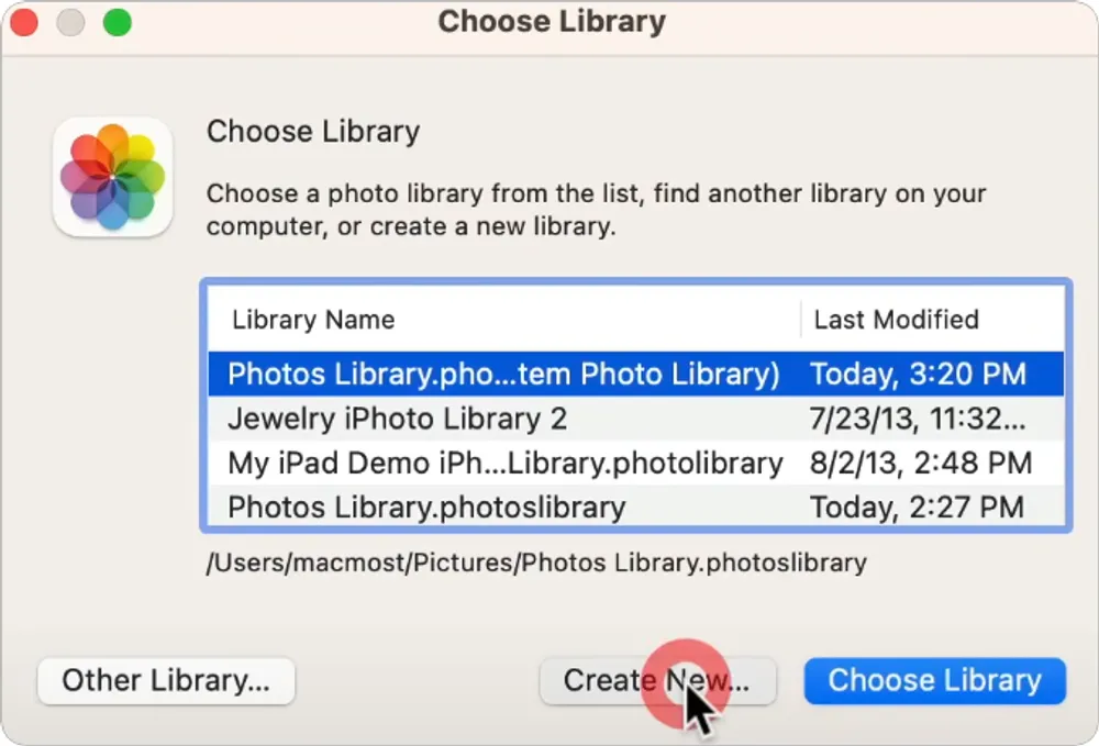 Mac Photos library selection window with arrow pointing to “Create New” button