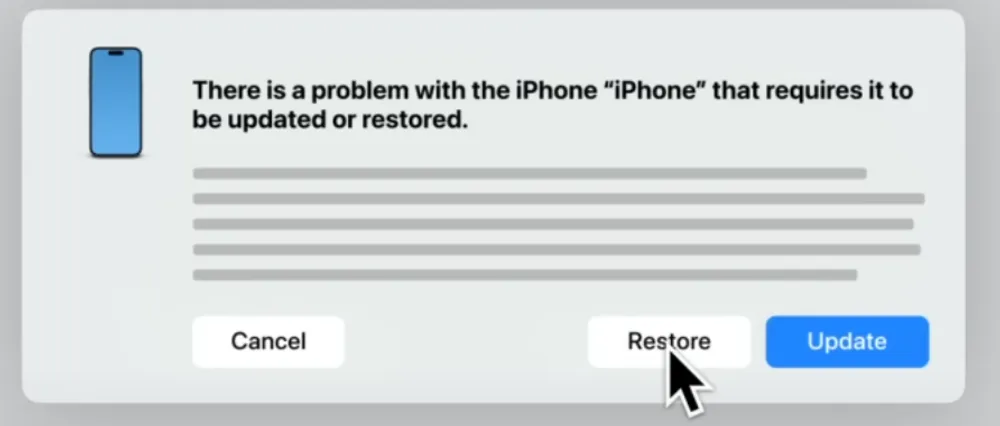 Finder window on Mac showing the pop-up message for restoring an iPhone.