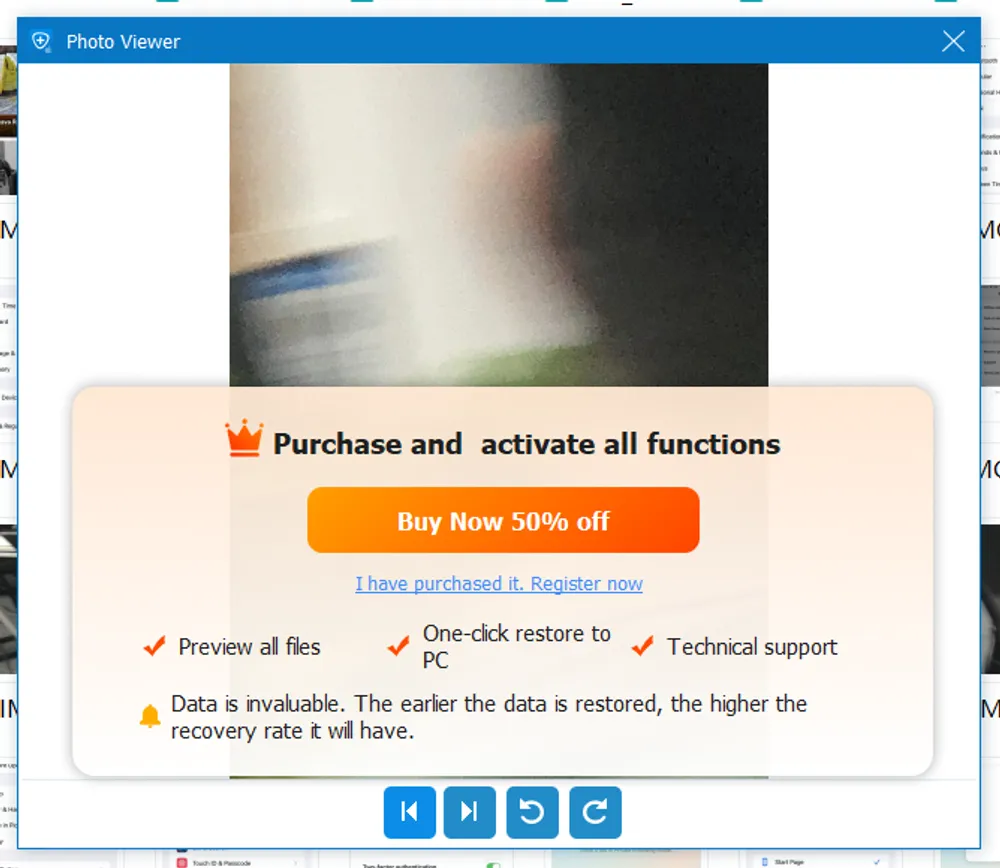Centrally-placed prompt blocks the view of recoverable photos on Fonelab